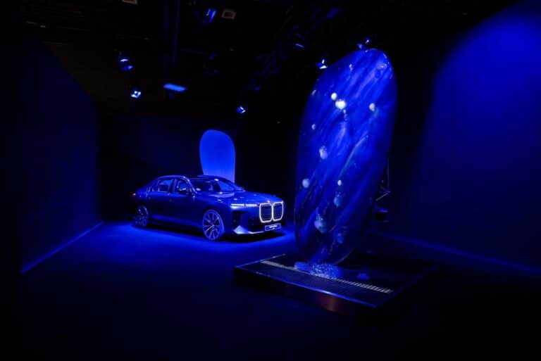 BMW SYMBIOSIS installation by A.A. Murakami at Art Basel, bubbles and light around the BMW M760e xDrive, a study in brand patronage