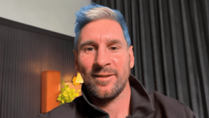 Lionel Messi with blue and white hair generated via ChatGPT Images for OpenAI MessiMode World Cup campaign