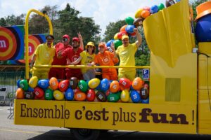 600 giant M&M’S on wheels. How Mars rolls into the Tour de France caravan. 600 giant M&M’S on wheels. How Mars rolls into the Tour de France caravan.