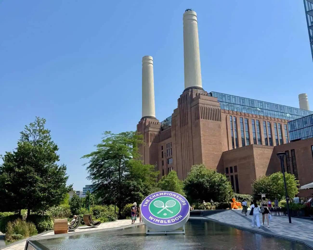 The Championships Wimbledon roundel in the Power Station Park water feature at Battersea Power Station, the 2026 Wimbledon Experience fan village